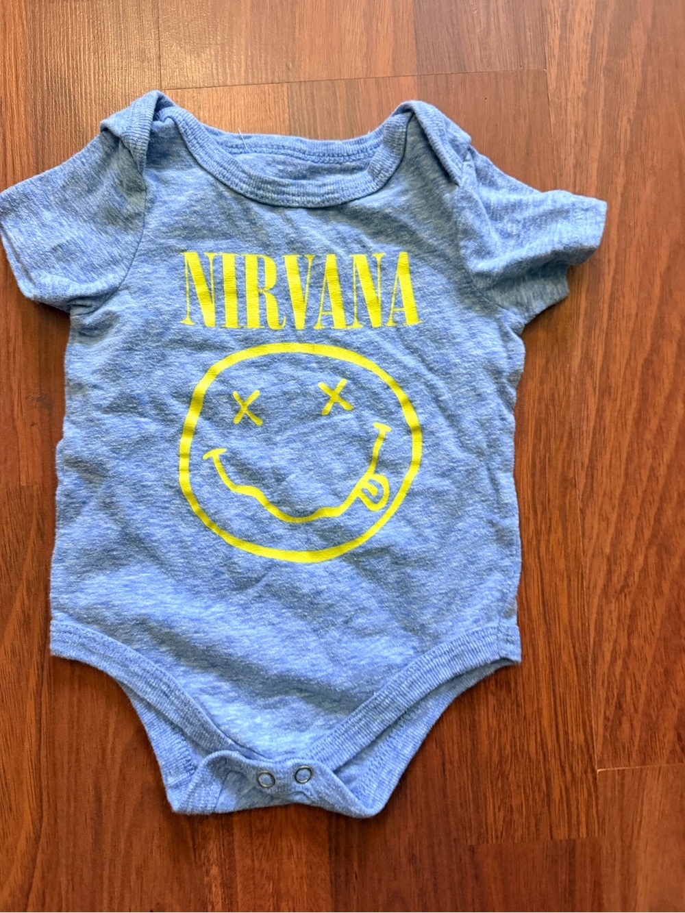 NIRVANA Heather Blue Infant Onesie with Yellow Smiley Logo